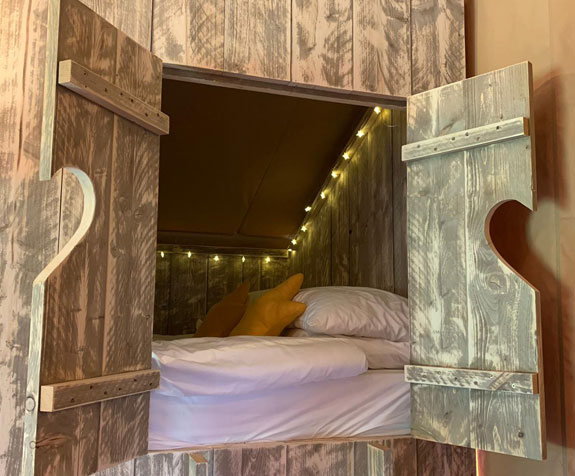 Glamping cabin bedNorwich